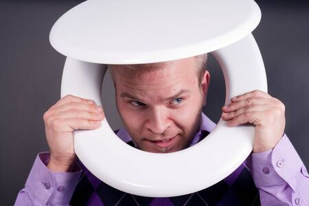 young handsome man in  toiletの写真素材