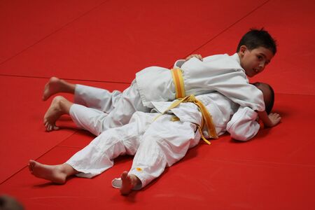 BUDAORS, HUNGARY - JUNE 11: Unknown mans participates in Sportfest, make a judo traning on June 11, 2011 in Budaors, Hungaryのeditorial素材