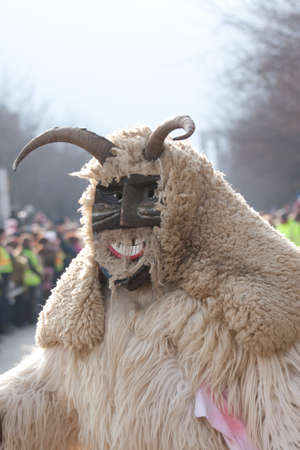 MOHACS, HUNGARY - MARCH 6: Unidentified people in mask participants at the Mohacsi Busojaras, it is a carnival for spring greetings) March 6, 2011 in Mohacs, Hungary.のeditorial素材