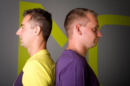 two attractive guy posing togetherの写真素材