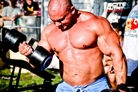 SIOFOK - AUG 4: Kokeny Bela participate in Scitec Muscle Beach bodybuilding seminar on August 4, 2012 in Siofok, Hungaryのeditorial素材