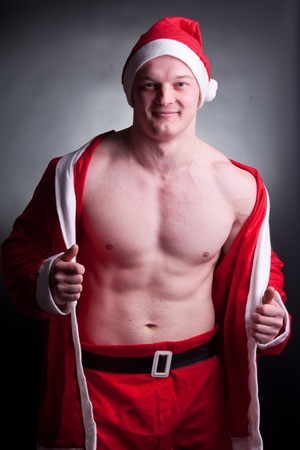 muscular santa claus posing in studioの写真素材