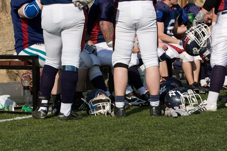 KOZARMISLENY - APRIL 4: Zala Predators (blue) and Pecs Gringos (white) american football teams participate in Hungarian Championship, April 4, 2009 in Kozarmisleny, Hungary.のeditorial素材