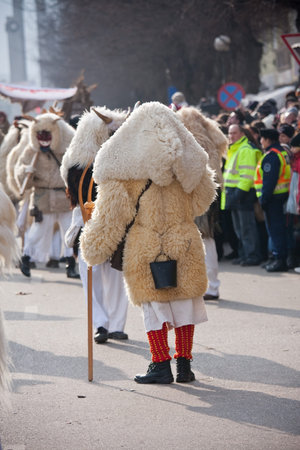 MOHACS, HUNGARY - MARCH 6: Unidentified people in mask participants at the Mohacsi Busojaras, it is a carnival for spring greetings) March 6, 2011 in Mohacs, Hungary.のeditorial素材