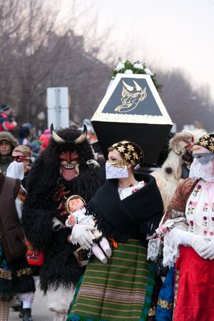 MOHACS, HUNGARY - MARCH 6: Unidentified people in mask participants at the Mohacsi Busojaras, it is a carnival for spring greetings) March 6, 2011 in Mohacs, Hungary.のeditorial素材