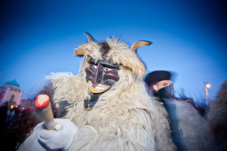 MOHACS, HUNGARY - FEBRUARY 12: Unidentified people in mask participants at the Mohacsi Busojaras, it...