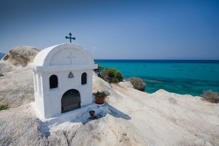 Small Greek chapel with blue skyの写真素材