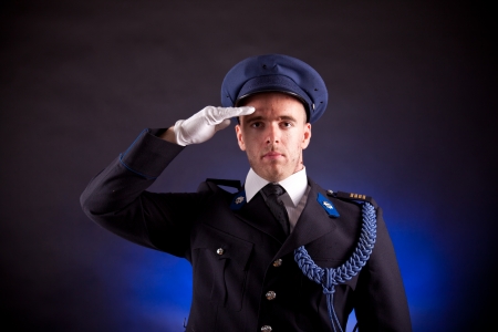 elegant soldier wearing uniform in studioの写真素材