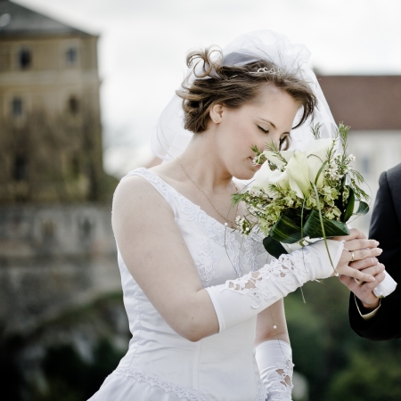 young beautiful wedding couple outdoor -colorized photo for old moodの写真素材