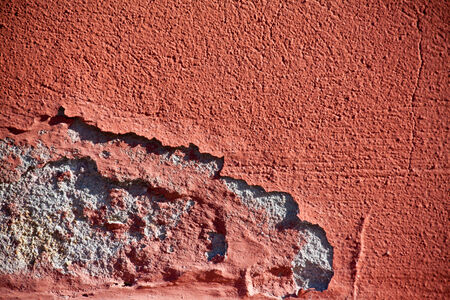 Antique flaked plaster wall texture backgroundの写真素材
