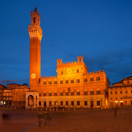 Piazza del Campo with Palazzo Pubblico at night , Siena, Italyのeditorial素材