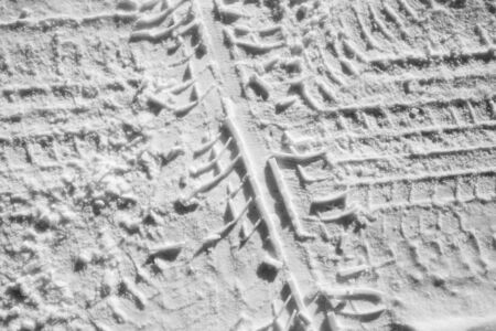 tire track with deep pattern in snowの写真素材