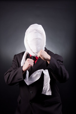 a businessman with toilette paperの写真素材