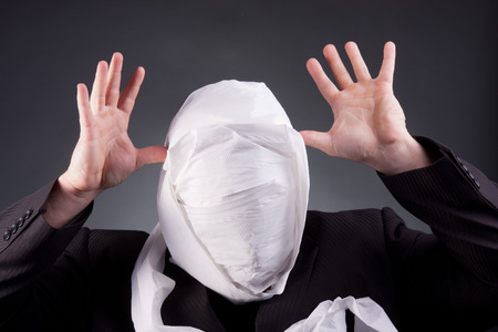 a businessman with toilette paperの写真素材