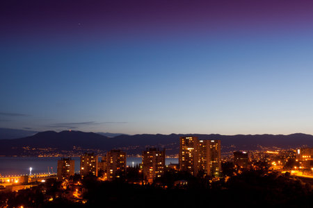 Old panel apartments in Rijeka at nightの写真素材