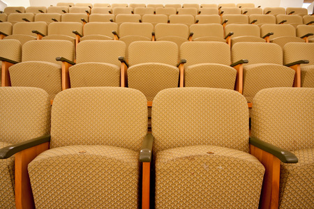 empty cinema chairs in rowの写真素材