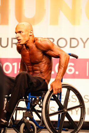 TATABÃNYA, HUNGARY - JUNE 6: Unknown competitor participate in INBA bodybuilding Championship disabled category on June 10, 2015 in TatabÃ¡nya, Hungaryのeditorial素材