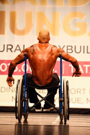 TATABÃNYA, HUNGARY - JUNE 6: Unknown competitor participate in INBA bodybuilding Championship disabled category on June 10, 2015 in TatabÃ¡nya, Hungaryのeditorial素材