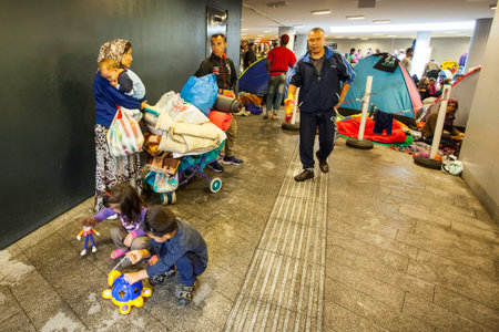 BUDAPEST - SEPTEMBER 4 : War refugees at the Keleti Railway Station on 4 September 2015 in Budapest,...