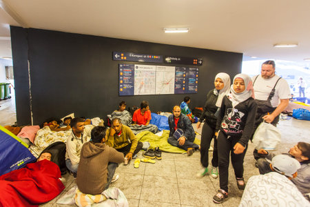 BUDAPEST - SEPTEMBER 4 : War refugees at the Keleti Railway Station on 4 September 2015 in Budapest,...
