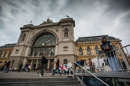 BUDAPEST - SEPTEMBER 4 : War refugees at the Keleti Railway Station on 4 September 2015 in Budapest, Hungary. Refugees are arriving constantly to Hungary on the way to Germany.のeditorial素材