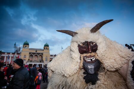 MOHACS, HUNGARY - FEBRUARY 17: Unidentified people in mask participants at the Mohacsi Busojaras, it is a carnival for spring greetings February 17, 2015 in Mohacs, Hungary.のeditorial素材