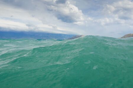 stormy adriatic sea in Baska, Croatiaの写真素材