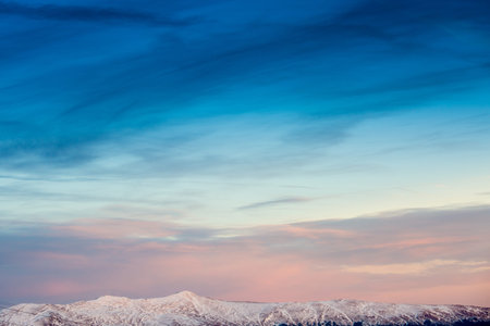 Winter landscape in Austria with hillsの写真素材