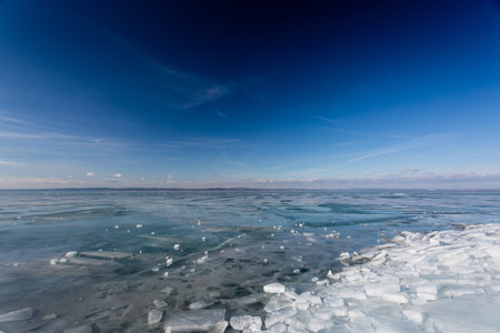 frozen lake Balaton with beautiful sky