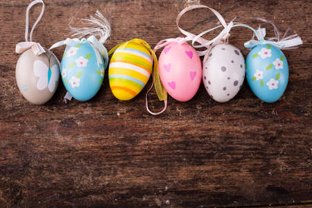 easter eggs on rustic wooden backgroundの写真素材