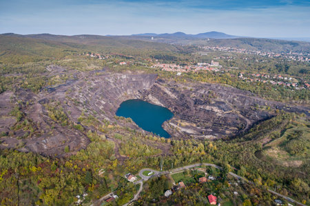 Aerial view, deep mine lake in place of a mining pit