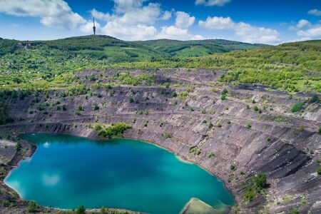 Aerial view, deep mine lake in place of a mining pitの写真素材