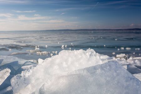 frozen lake Balaton with beautiful skyの写真素材