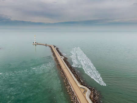 Icy Lake Balaton with pier in Siofokの写真素材