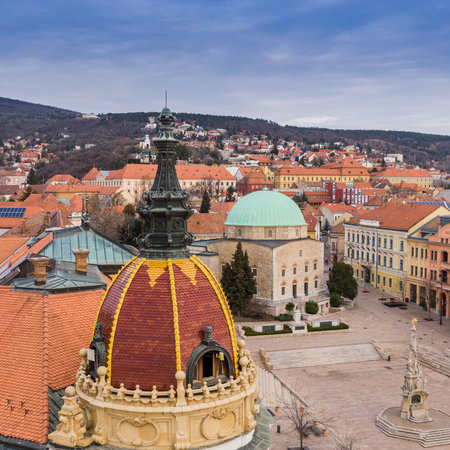 Aerial view of Pecs, Hungary with colorful rooftop of Megyehaza building