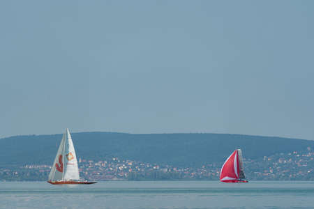 ZAMARDI - JULY 29: Sailing boats compete on the 52nd Blue Ribbon Championship at the Lake Balaton on 29 July 2020 in Zamardi, Hungary.のeditorial素材