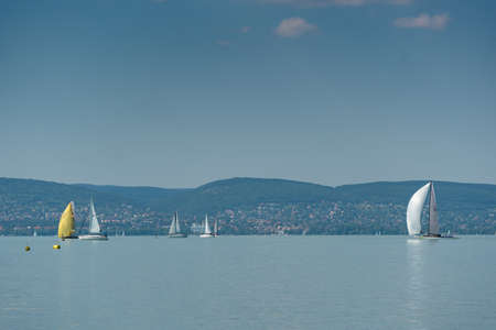 ZAMARDI - JULY 29: Sailing boats compete on the 52nd Blue Ribbon Championship at the Lake Balaton on 29 July 2020 in Zamardi, Hungary.のeditorial素材