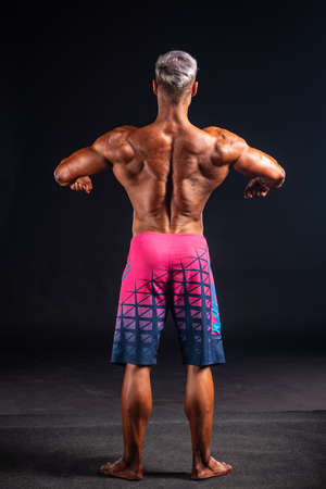 2019 in Budapest, hungary, HUNGARY - OCT 13: men's physique competitor studio photo safter Fitparade 2019 championship on Oct 13, Budapestのeditorial素材