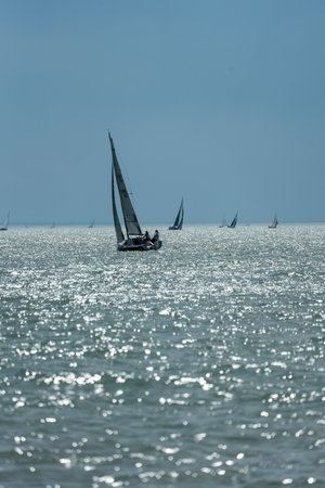 TIHANY - JULY 14 : Sailing boats compete on 54.th Kekszalag championship at the Lake Balaton on 14 July 2022 in Tihany, Hungary.のeditorial素材
