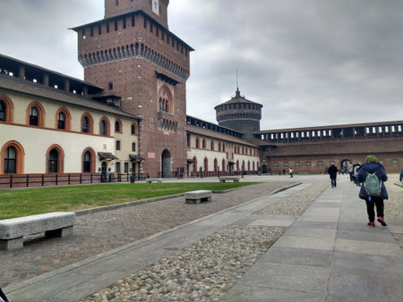 Tourists visit the Sforza Castle in Milan, Italy. Sforza Castle is one of the main tourist attractions in Milan.の写真素材