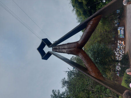View from below of a wooden bridge over the river in the villageの写真素材