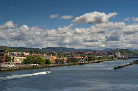 View of the Nervi?n river passing through Portugalete, in the Spanish Basque countryの写真素材