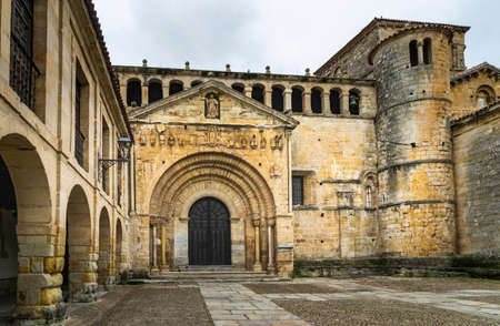Main facade view of the Romanesque collegiate church of Santillana del Mar in Cantabria in Spain.の写真素材
