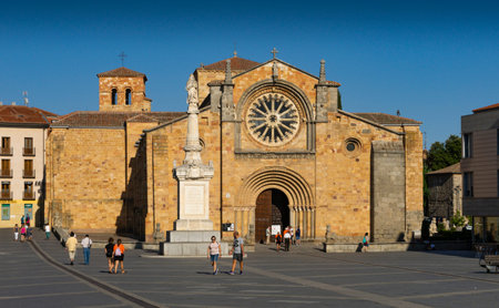 View of a square in the medieval city of Avila with the Romanesque Church of San Pedro in the...