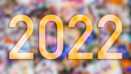 Text of the new year 2022 made with photographs of colored elements with the background out of focus.の写真素材