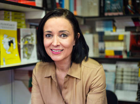 Portrait looking at the camera of the Spanish lawyer Cruz Sanchez de Lara posing at the Madrid Book Fair. Activist in the defense of human rights and sustainability.のeditorial素材
