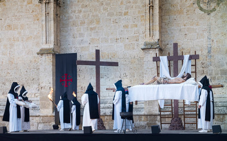 Easter Week in Palencia, Spain. Penitents and monks carrying the image of the dead Jesus Christ.のeditorial素材