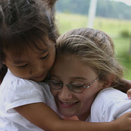 girls huggingの写真素材