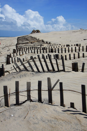 sandy beach fenceの写真素材