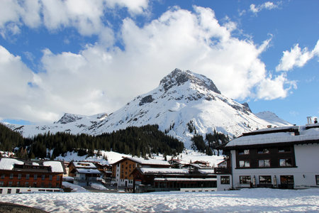 Village of Lech, an Austrian Ski Resort with Blue Sky and Alps Mountain